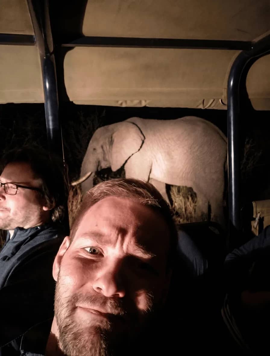Grainy night photo from the first night game drive, elephant next to the vehicle